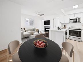 Mesa apartment for rent - a living room with a table and a bowl of fruit