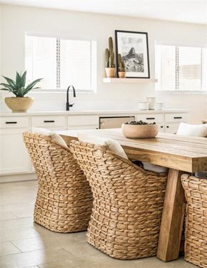 Mesa apartment for rent - A kitchen with a table and chairs with a bowl of fruit on the table.