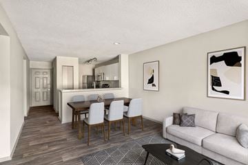 Chapel Hill apartment for rent - A modern living room with a dining table and chairs.