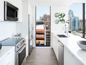 Los Angeles apartment for rent - a white kitchen with a view of the city