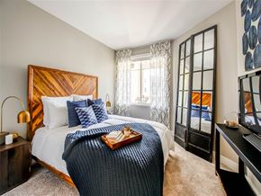 Northridge apartment for rent - a bedroom with a bed and a window