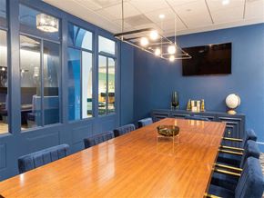 Washington apartment for rent - a large conference room with a wooden table and chairs