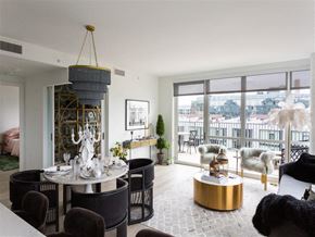 Washington apartment for rent - a living room with a table and chairs and a balcony