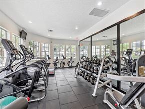 Coral Springs apartment for rent - A gym with treadmills, elliptical machines, and other cardio equipment.
