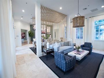 Miramar apartment for rent - A living room with a white couch and a black coffee table.
