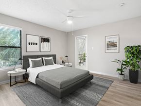 Tampa apartment for rent - an image of a bedroom with a bed