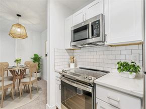 Tampa apartment for rent - a kitchen with a stove and a microwave