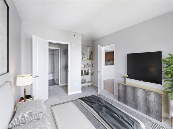Cambridge apartment for rent - a bedroom with a bed and a tv