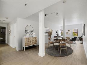 Cambridge apartment for rent - a living room and dining room with a table and chairs
