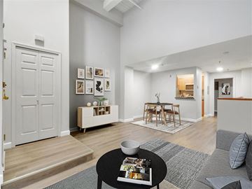 Cambridge apartment for rent - A living room with a black coffee table and a bowl on it.