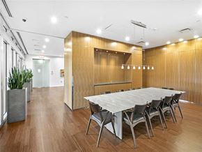 Cambridge apartment for rent - A conference room with a long table and chairs.