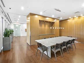 Cambridge apartment for rent - A conference room with a long table and chairs.
