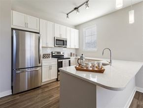 Mt Laurel Township apartment for rent - a kitchen with stainless steel appliances and a counter top
