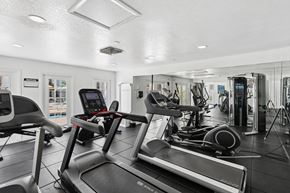 Glendale apartment for rent - A gym with treadmills, exercise bikes, and other equipment.