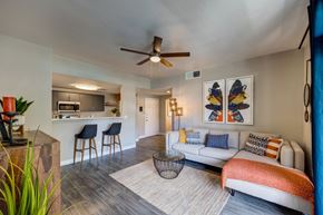 Las Vegas apartment for rent - a living room with a couch and a ceiling fan
