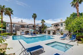 Las Vegas apartment for rent - our apartments have a large swimming pool and a patio with chairs
