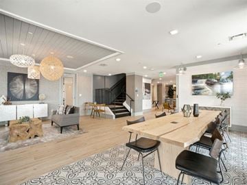 Wilmington apartment for rent - a living room and dining room with a wooden table