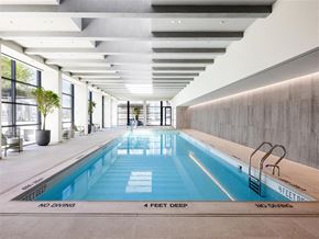 Bronx apartment for rent - A swimming pool with a blue bottom and a white top with the words