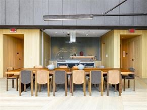 Brooklyn apartment for rent - A modern dining room with a wooden table and chairs.