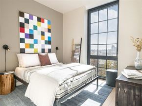 Brooklyn apartment for rent - a bedroom with a bed and a window