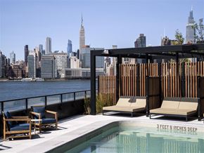 Brooklyn apartment for rent - a rooftop pool with a view of the city and the empire state building