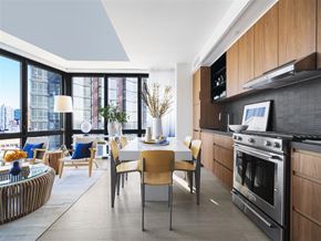 Brooklyn apartment for rent - a kitchen and living room with a table and chairs