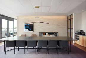 Arlington apartment for rent - A modern dining room with a long table and chairs.