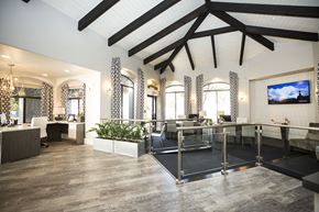 Phoenix apartment for rent - a large lobby with a bar and a tv