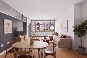 Dallas apartment for rent - A living room with a table and chairs.