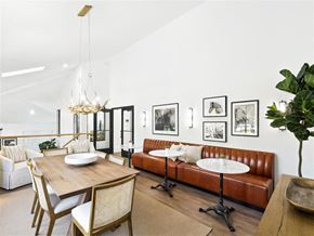 Murray apartment for rent - the living room has a leather couch and a dining table