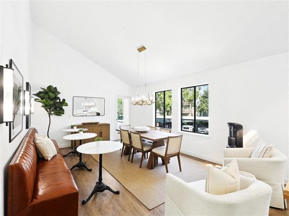 Murray apartment for rent - a living room with a couch and a table with chairs
