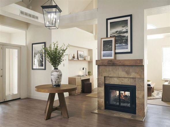 Murray apartment for rent - a living room with a fireplace and a table