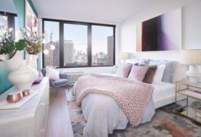 Jersey City apartment for rent - a bedroom with a bed and a large window