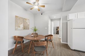 Las Vegas apartment for rent - A dining room with a table and chairs.