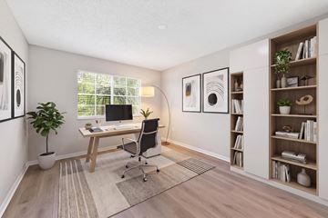 Miramar apartment for rent - A room with a desk, chair, and a bookshelf.