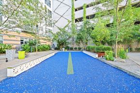 Pittsburgh apartment for rent - a large blue carpeted pool in front of a building