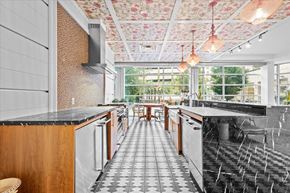 Pittsburgh apartment for rent - a large kitchen with marble counter tops and a large window