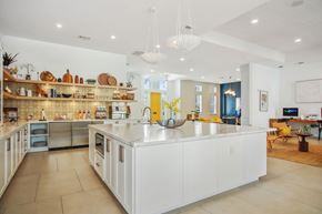 Kissimmee apartment for rent - Resident clubhouse with a large white kitchen with a large island in the middle