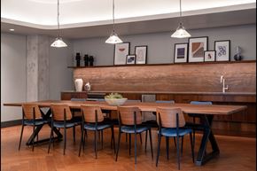San Francisco apartment for rent - A modern dining room with a wooden table and chairs.
