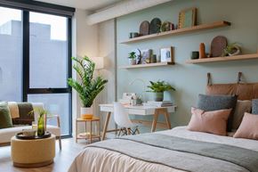 San Francisco apartment for rent - A bedroom with a large bed and a desk with a chair.