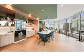 Seattle apartment for rent - a large dining room with a long table and chairs