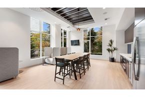 Seattle apartment for rent - a dining room with a table and chairs