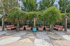 Pittsburgh apartment for rent - A park with a bench and a tree.