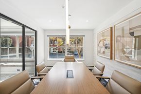 San Francisco apartment for rent - a conference room with a long wooden table and chairs
