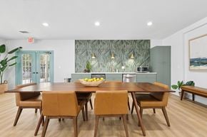 Tampa apartment for rent - A dining room with a table and chairs.