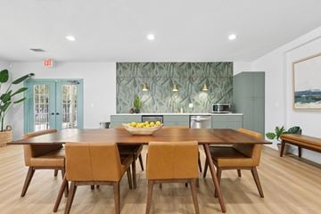 Tampa apartment for rent - A dining room with a table and chairs.