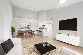 Coral Springs apartment for rent - A modern living room with a black coffee table in the center.