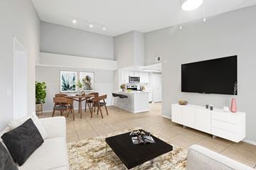 Coral Springs apartment for rent - A modern living room with a black coffee table in the center.