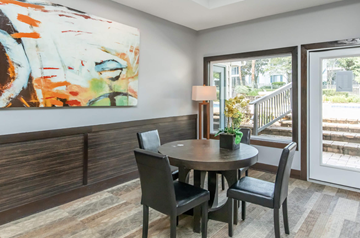 Tallahassee apartment for rent - A dining room with a round table and chairs.