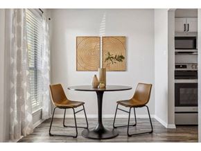 Denton apartment for rent - a dining room with a table and two chairs